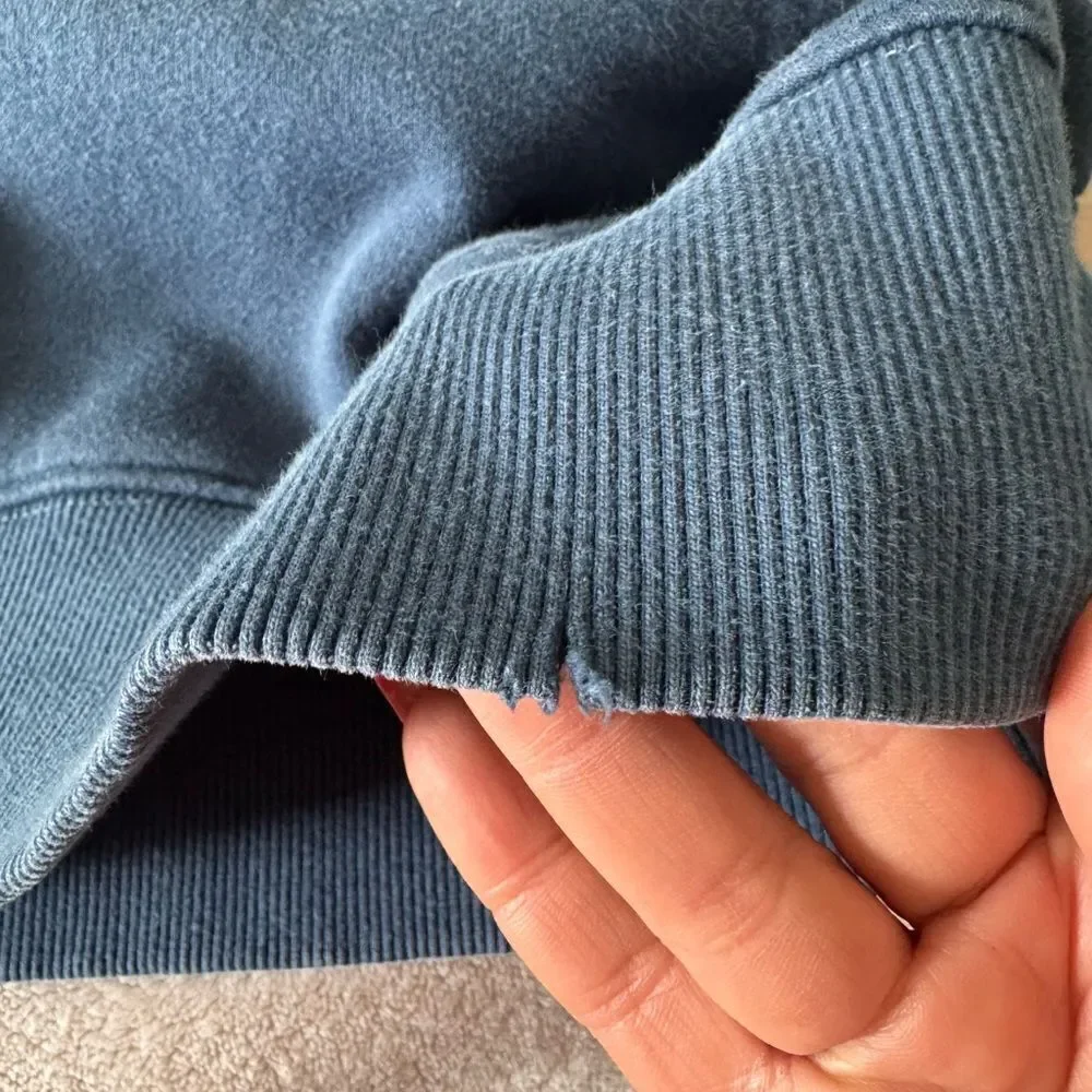 The North Face Blue Pullover Hoodie with Ribbed Cuffs